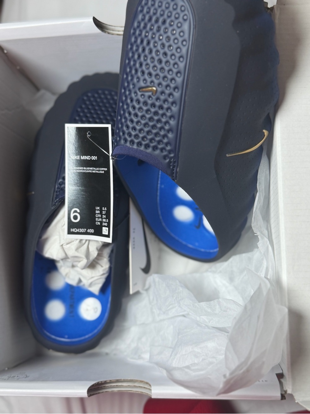 Nike Men's Navy and Blue Slide Sandals with Gold Swoosh